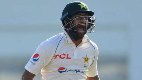 Pakistan batter Imam-ul-Haq roars in delight after hitting his maiden Test century against Australia
