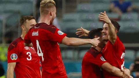 Xherdan Shaqiri (right) celebrates his goal with Switzerland team-mates