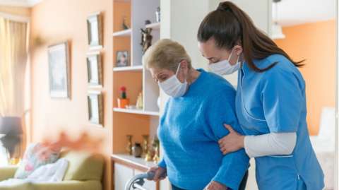 Care worker with elderly woman
