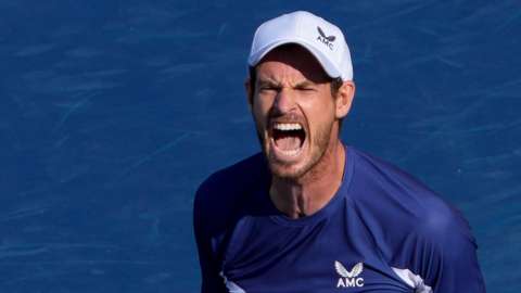 Andy Murray celebrates beating Stan Wawrinka in their Western and Southern Open first-round match