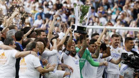 Real Madrid lifting the La Liga trophy