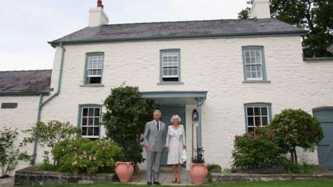 Prince Charles and the Duchess of Cornwall outside Llwynywermod in 2009