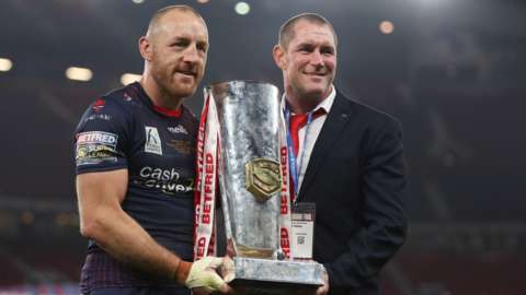 James Roby and Kristian Woolf with the Super League trophy