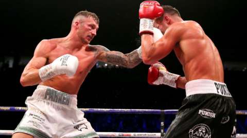 Zach Parker aims a jab at his opponent