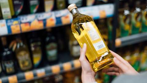 Olive oil in a supermarket (stock image)