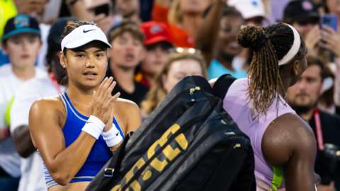 Emma Raducanu claps Serena Williams off the court after their Western and Southern Open match in Cincinnati
