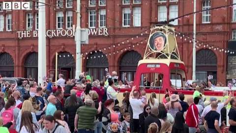 Tram and crowds in Blackpool