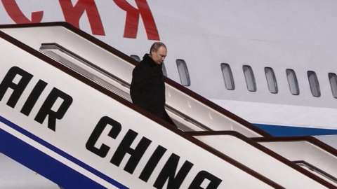 Russia's President Vladimir Putin disembarking upon his arrival in Beijing on February 4, 2022, ahead of his meeting with China's president and the opening ceremony of the 2022 Winter Olympic Games