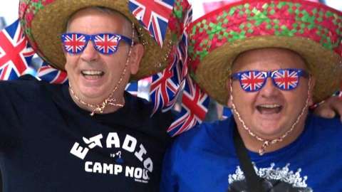 Two Rangers fans wearing sombreras