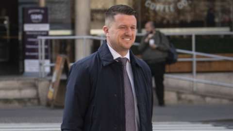 Tommy Robinson arriving at the Royal Courts of Justice in 2021
