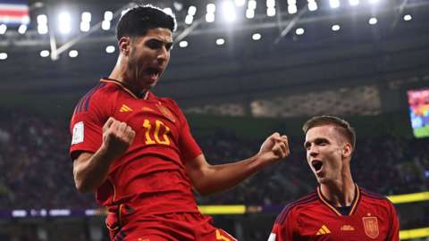 Marco Asensio celebrates after scoring Spain's second goal