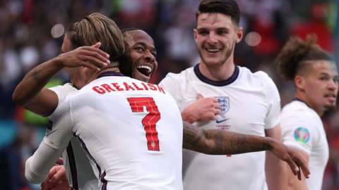 England players celebrate their opener