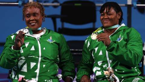 Bose Omolayo and Folashade Oluwafemiayo celebrate with their Commonwealth Games medals