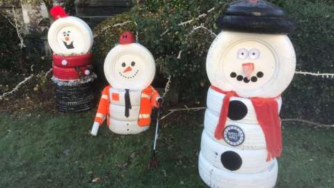 Snowmen made from old tyres in Sudbury