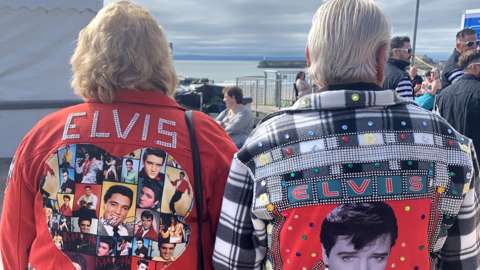 Two people with Elvis jacket