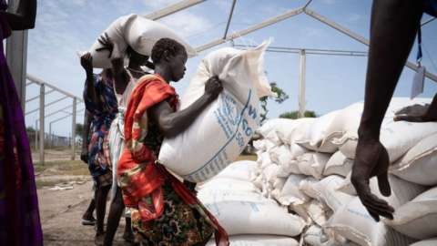 A person in South Sudan receiving aid