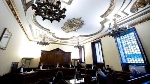 Image shows the Vatican courtroom