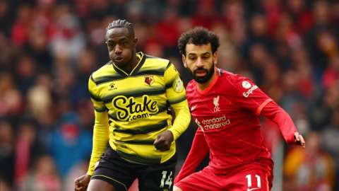 Hassane Kamara in action for Watford against Mohamed Salah and Liverpool