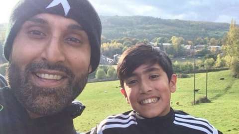 Khalil Ahmed (left) with his son Sami Ahmed