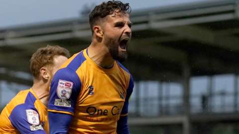 Steve McLaughlin's eighth goal of the season secured Mansfield Town's place at Wembley