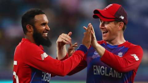 England white-ball captain Eoin Morgan (right) celebrates a wicket with Adil Rashid (left)