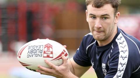 Harry Smith of Wigan Warriors and England throws a pass