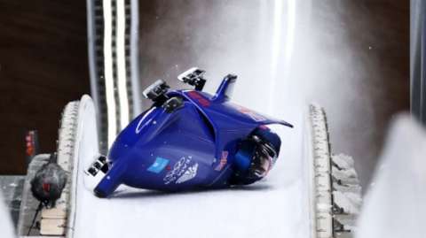 Brad Hall and Nick Gleeson crash in two-man bobsleigh