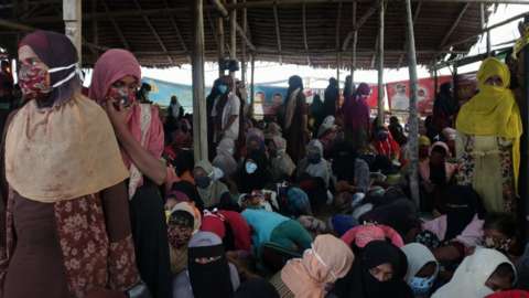 Rohingya refugees take rest after disembarking from a boat at Rancong Beach, Lhok Seumawe, North Aceh, Indonesia, 07 September 2020