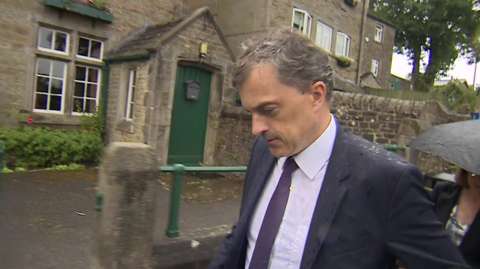 Julian Smith being questioned by a BBC reporter