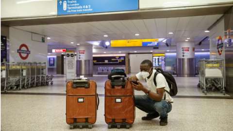 Man with suitcases