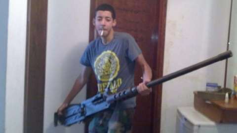 Salman Abedi holding a large gun
