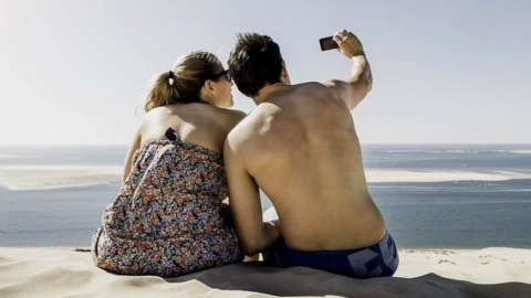 Stock image of people taking a selfie in France