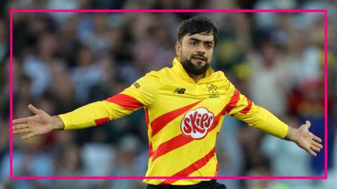 Rashid Khan with his arms outstretched, celebrating a wicket for Trent Rockets