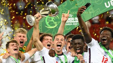 England's players celebrate winning the European Under-19 Championship
