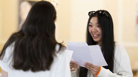 Si Tong Xie smiles after she receives her A Level results at Ffynone House School on August 18, 2022 in Swansea