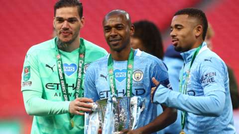 Manchester City's Ederson, Fernandinho and Gabriel Jesus with the EFL Cup
