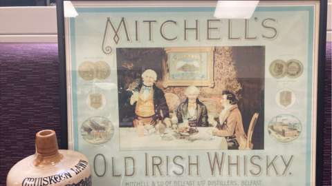 A picture advertising Mitchell's whiskey