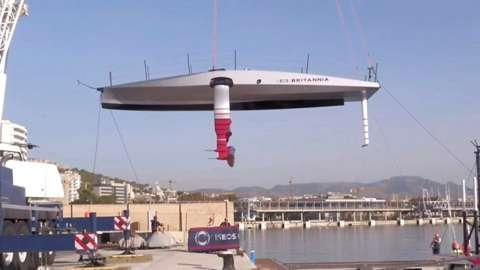 Americas Cup boat being lifted into the water