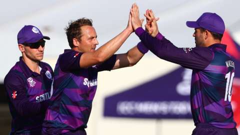 Scotland's Josh Davey celebrates taking a wicket against Papua New Guinea in the T20 World Cup