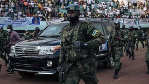 The motorcade of the President of the Central African Republic, arrives at the 20,000-seat stadium, for an electoral rally, escorted by the presidential guard, Russian mercenaries, and Rwandan UN peacekeepers