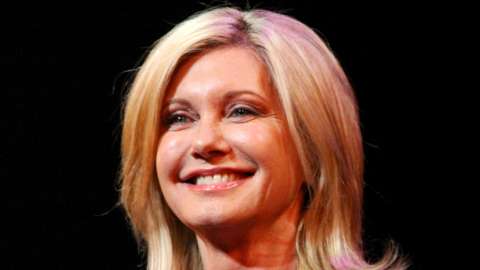Actress Olivia Newton-John visits the Broadway cast of Grease to promote Breast Cancer Awareness Month at the Brooks Atkinson Theatre on 7 October 2008 in New York City, US