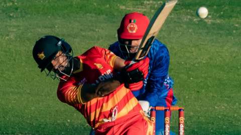 Zimbabwe's Sikandar Raza plays a shot against Afghanistan