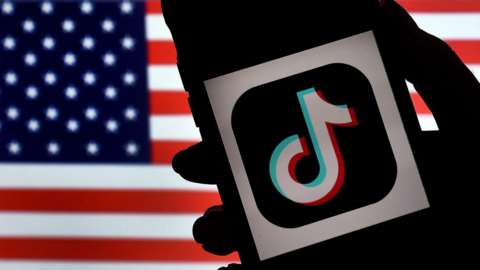 An image of the tiktok logo and the American flag