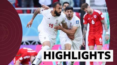 Iran's Rouzbeh Cheshmi celebrates his goal against Wales