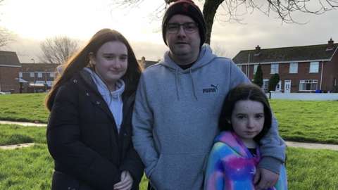 The Mellon family who were moved out of their home at 4.30am during a security alert in Londonderry. Dad Jonathan, Kaelah (15) and Farrah (10)