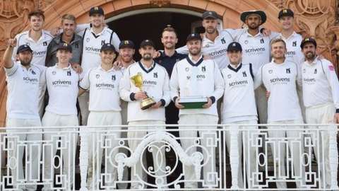 Warwickshire celebrating with the Bob Willis Trophy and County Championship.