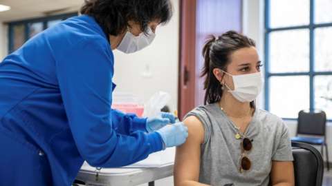 Sami Bates, 27, receives her coronavirus vaccine in Ohio