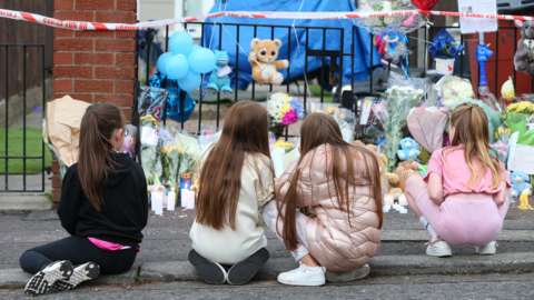 Children pay their respects