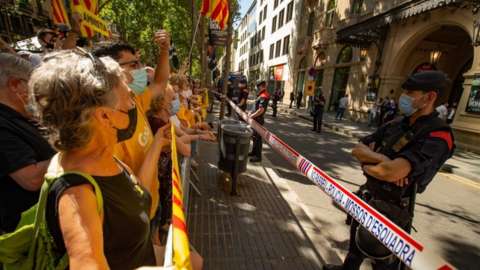 Pro-Catalan independence protesters gather outside the Liceu Theatre in Barcelona