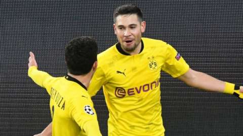 Borussia Dortmund's Raphael Guerreiro celebrates scoring